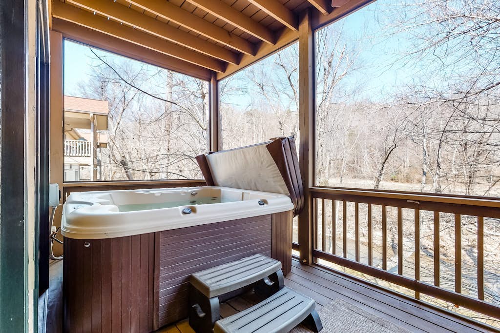 Three-Story Riverfront Home w/ a Private Hot Tub, Free WiFi and Four Fireplaces