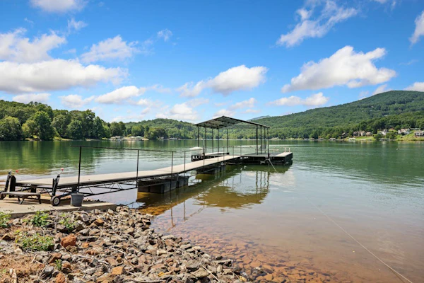 Stunning lakefront home with kayaks, dock, fireplace, game room, & washer/dryer