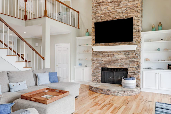 Stunning lakefront home with kayaks, dock, fireplace, game room, & washer/dryer