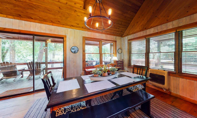 Waterfront cabin w/ private dock & hot tub, wood-burning fireplace, & swing