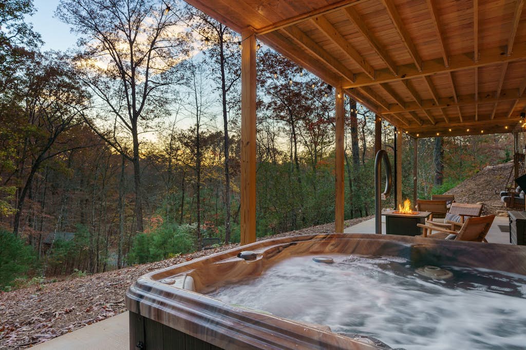 Secluded mountain home with two gas fireplaces, three fire pits, and sunroom