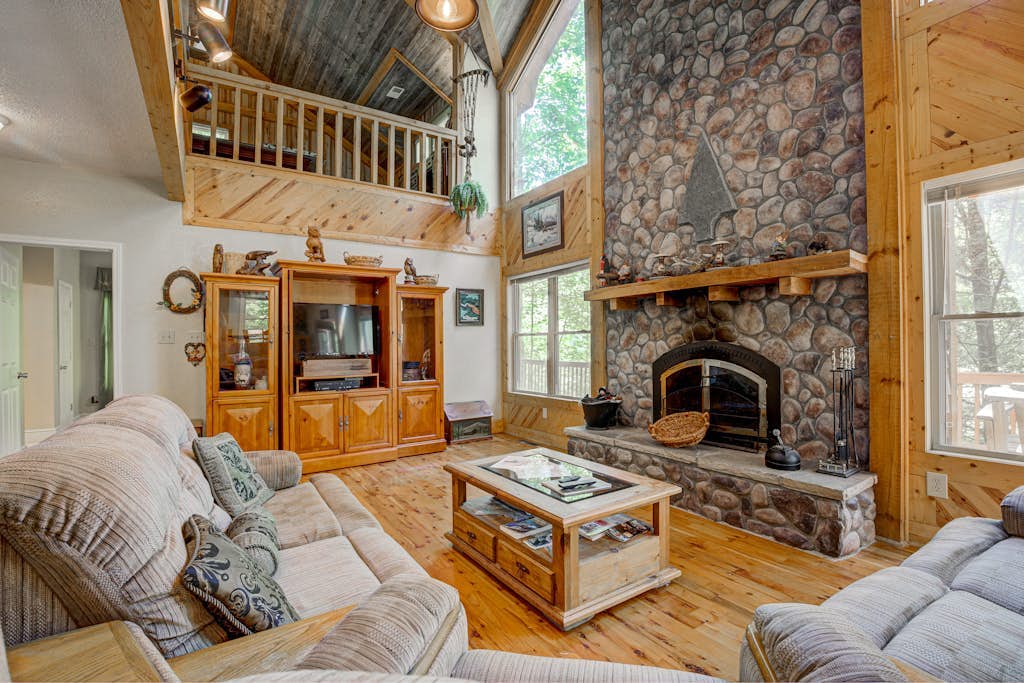 Dog-friendly riverfront cabin w/ waterfall view, large decks, firepit, Ping-Pong