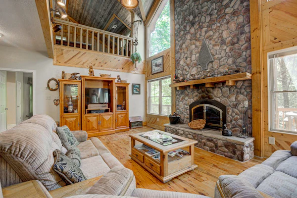 Dog-friendly riverfront cabin w/ waterfall view, large decks, firepit, Ping-Pong