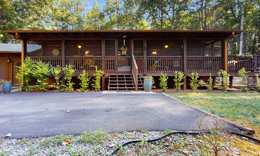 Cozy log cabin with hot tub, fire pit, and scenic screened porches