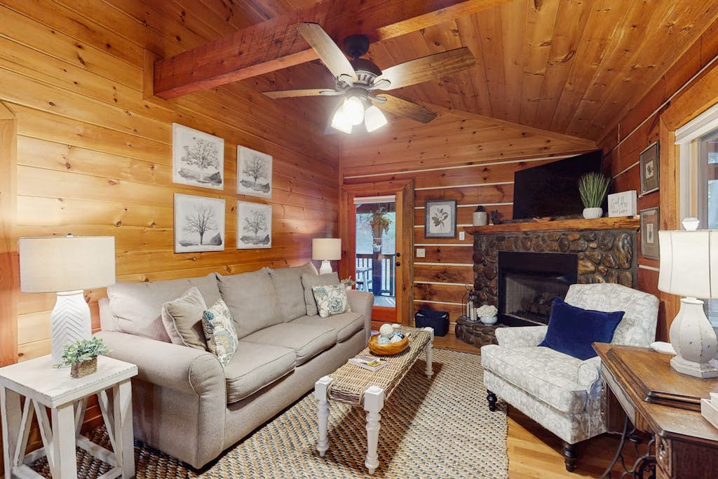 Cozy log cabin with hot tub, fire pit, and scenic screened porches