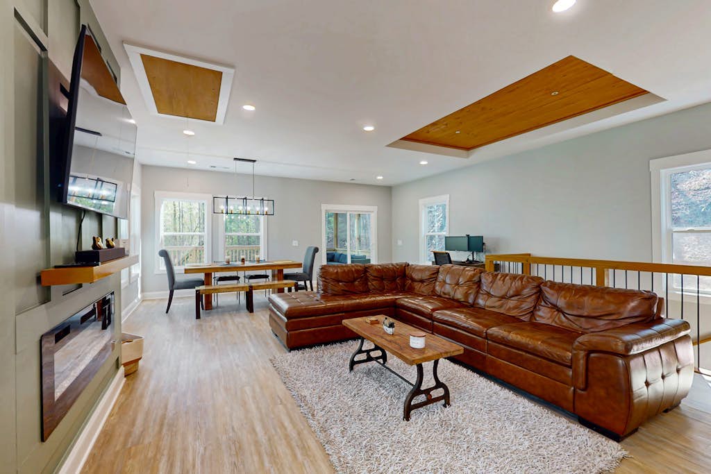 Modern farm style, dog friendly cabin with game room and screened in deck