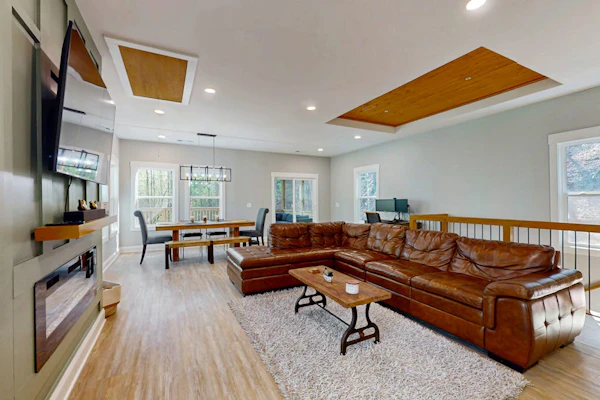 Modern farm style, dog friendly cabin with game room and screened in deck