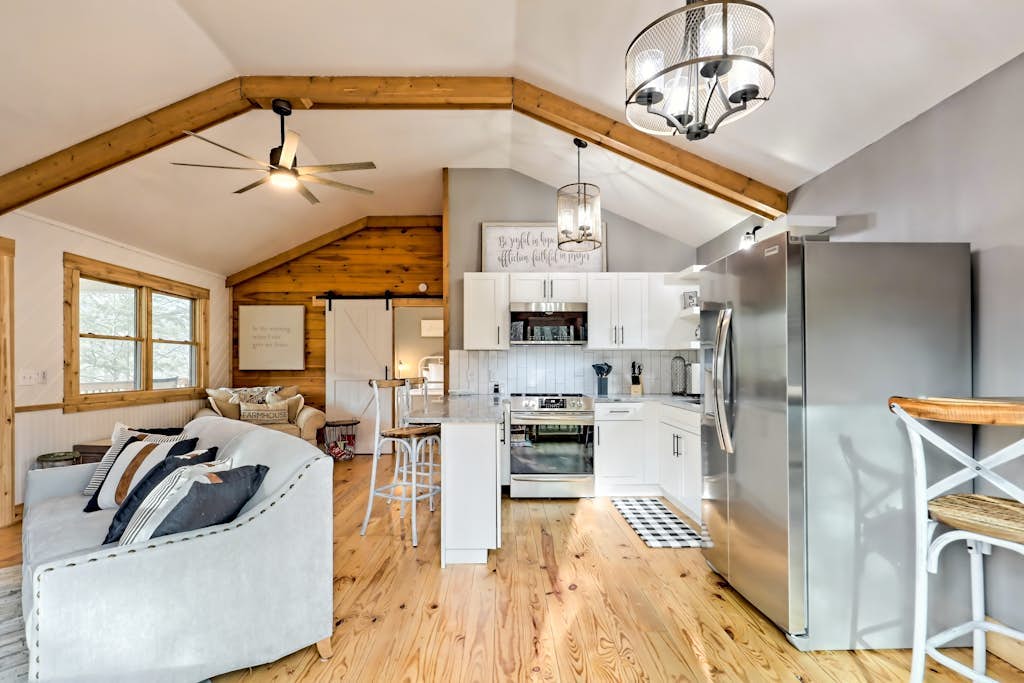 The Coop | Woodland cabin in Blairsville with wraparound porch & fireplace