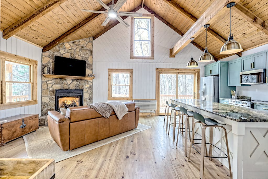 The Treehouse | Forest cabin in Blairsville with expansive deck & fireplace