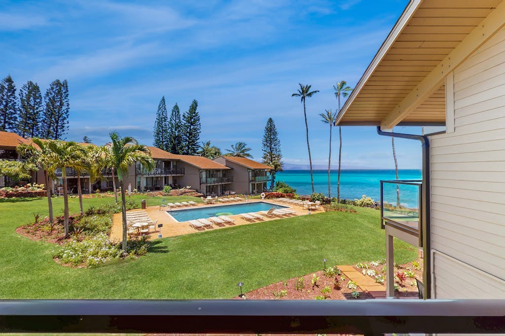 Oceanfront condo with furnished balcony, pool, loft, & high-speed WiFi