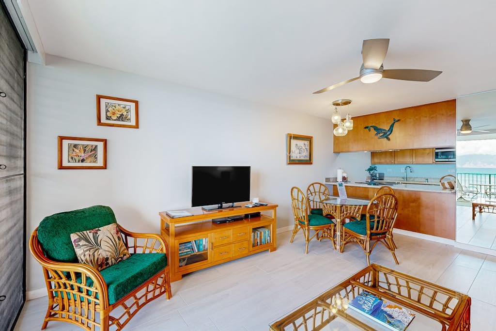 Ocean-view condo with balcony, pool, & sun loungers - walk to beach