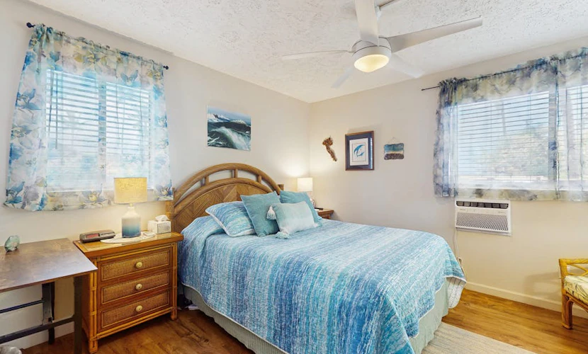 Peaceful, quiet condo with pool, private lanai, gas grill, WIFI, steps to beach