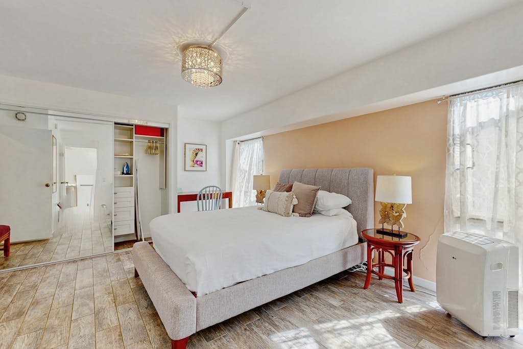 Inviting apartment with city views, WiFi, partial A/C, washer/dryer, & balcony
