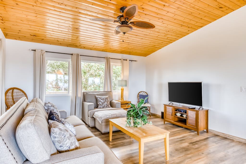 Newly updated home with pools, lanai, ocean view - walk to golf