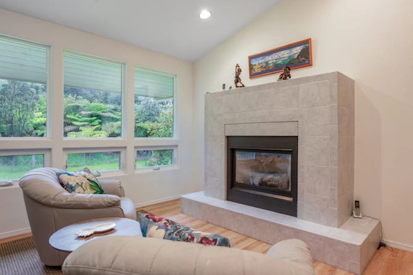 Bright home by the volcano with lanai, grill, open kitchen & fireplace