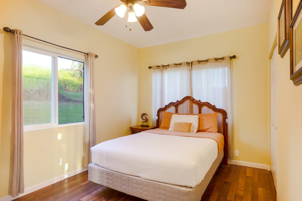 Spectacular two-story ocean-view home on two acres with covered lanai