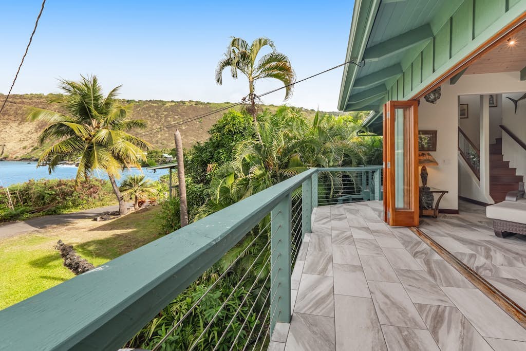Oceanfront sanctuary with light-filled interior, lanai, W/D, & full kitchen