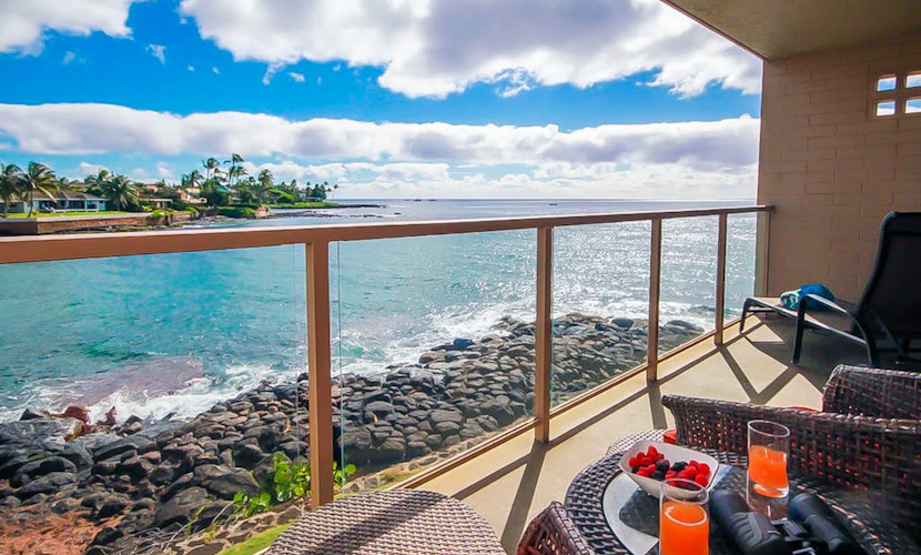 Beachfront Condo w/Partial A/C, Lanai, Ocean Views, Free WiFi, Shared W/D, & BBQ