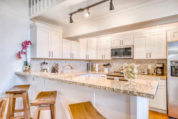 Bright two-story condo w/washer/dryer, shared outdoor pool, & free WiFi