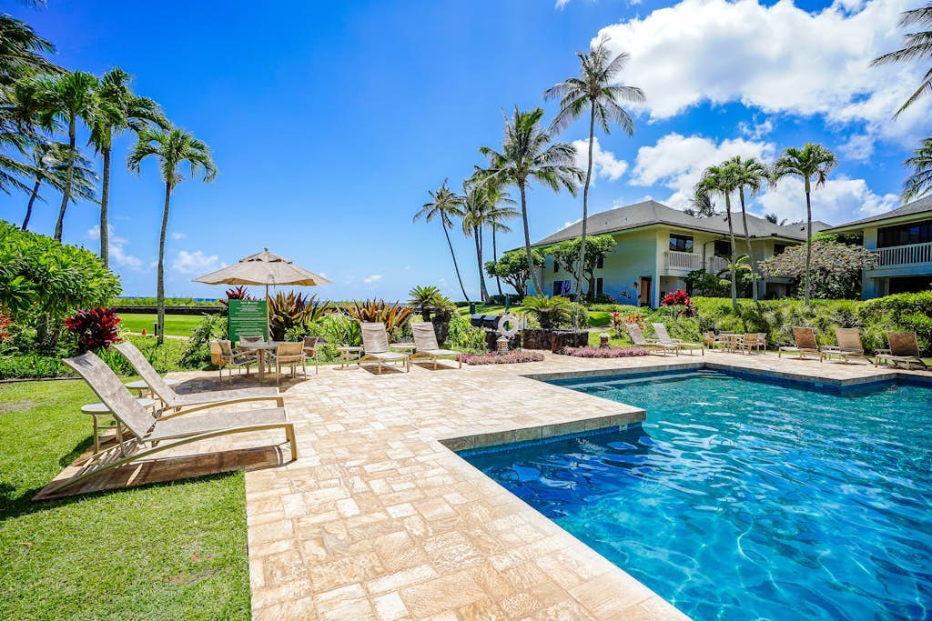 First-floor condo w/ ocean view, washer/dryer, &  outdoor pool