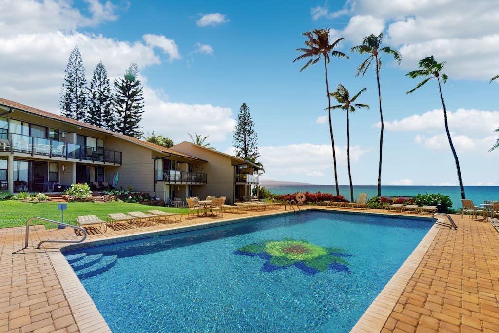 Stylish, oceanfront retreat with scenic balcony, pool & fast WiFi