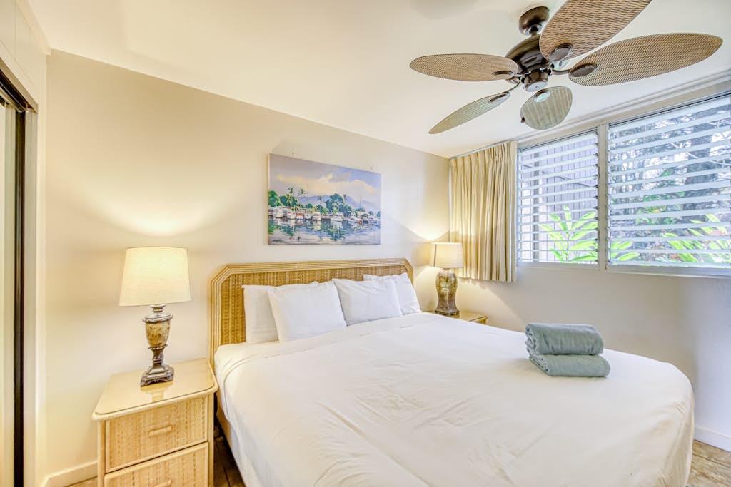 Ground-floor, ocean-view getaway with furnished patio, pool, & grills