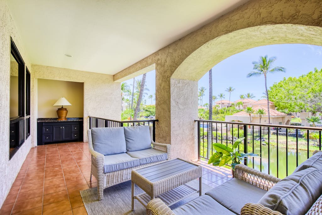 Elegant, second floor condo with lanai, pool and hot tub access, and central AC