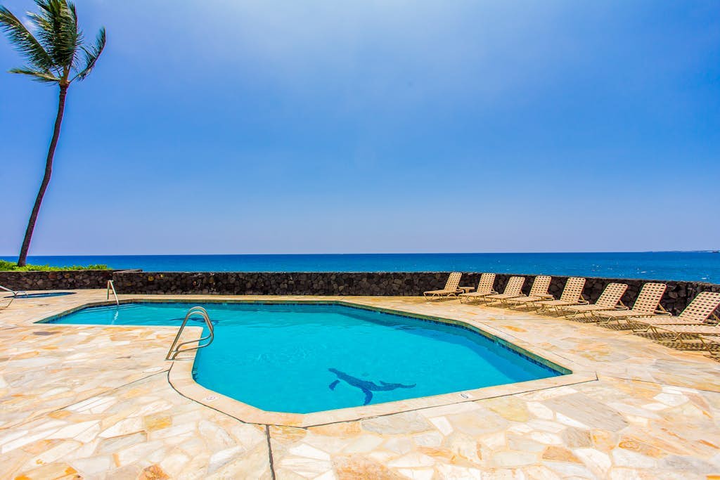 Oceanfront condo with lanai, pool, hot tub, WiFi, central AC, W/D & amazing view