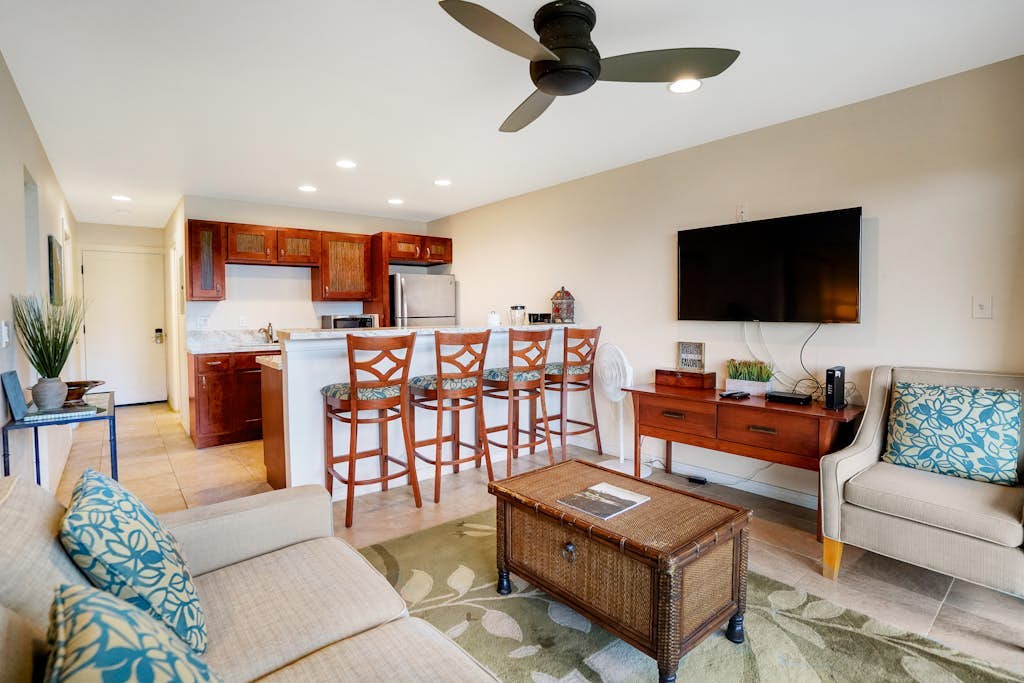 Waterfront condo on the ground floor with a pool, ocean views & beach access