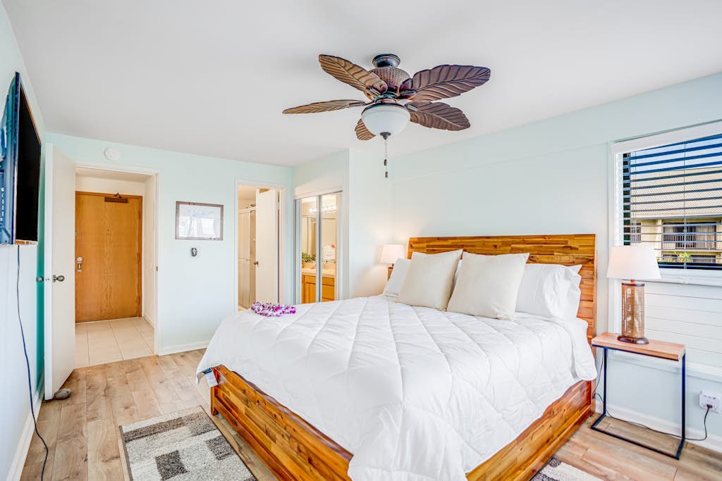 Water-view 3rd-floor condo with community pool & grills - near sights & dining