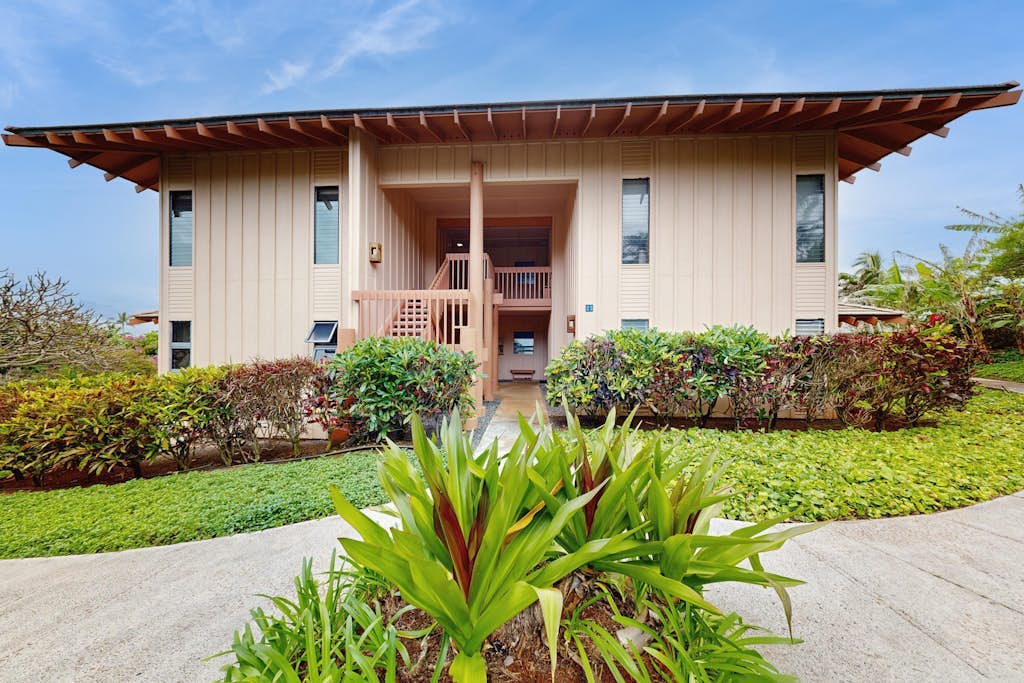 Condo with expansive ocean views from the kitchen, lanai & primary suite