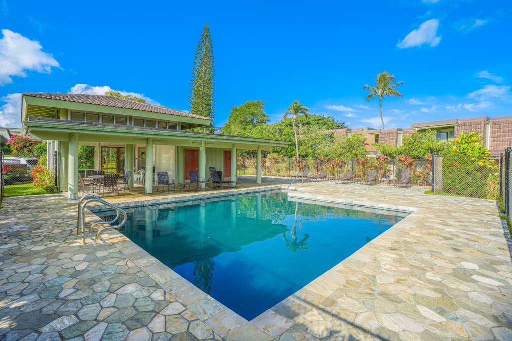 Condo w/ lush tropical surroundings, pool, golf nearby, WiFi, &W/D