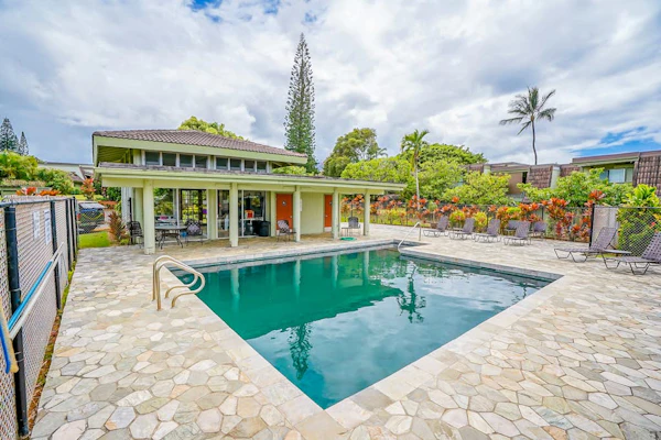 Lush end-unit condo with on-site pool, private lanais, grill, & washer/dryer