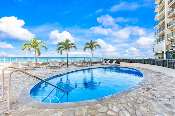 Oceanfront condo with ocean view, private washer/dryer, and access to pool