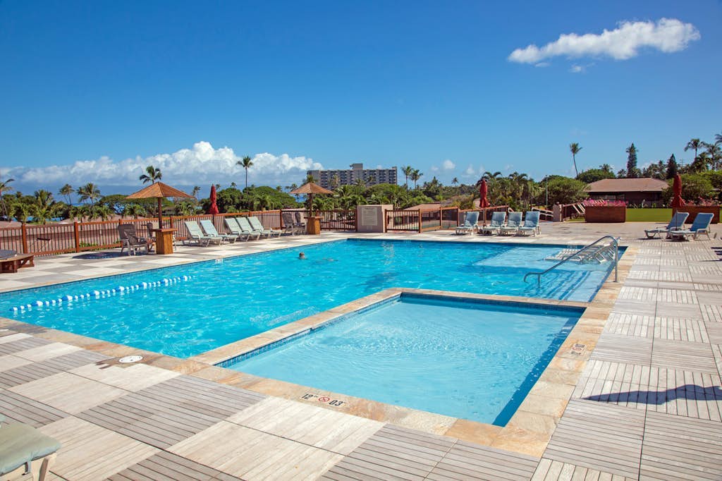 Tranquil tropical retreat with pool, hot tub, and golf nearby