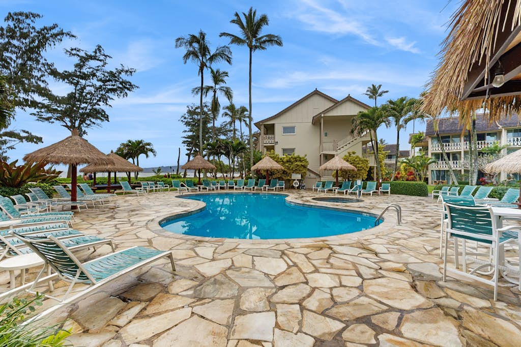 2nd floor studio with ocean views, pool, hot tub, AC - walk to beach