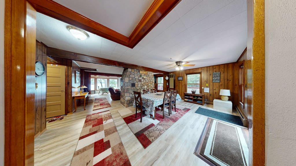 Lakefront home with, dock, kayaks, paddle boards, fire pit & more