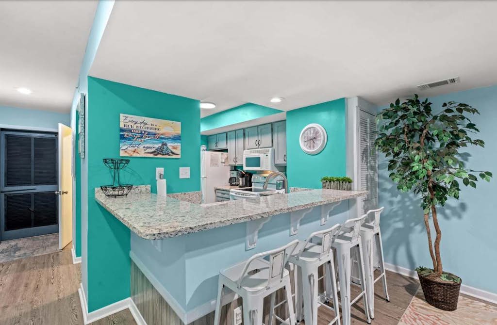 Welcome to Summertree A13, a spacious and inviting 2 bedroom, 2.5 bathroom beach retreat located just a short stroll from the sandy shoreline and nearby fishing pier. Thoughtfully designed for families and groups, this charming coastal getaway comfortably accommodates up to 6 guests with a king sized bed, two full sized beds, a full sleeper sofa, and a twin sleeper sofa. Whether you're planning a relaxing beach vacation or a fun filled family getaway, this condo offers the perfect blend of comfort, convenience, and location.