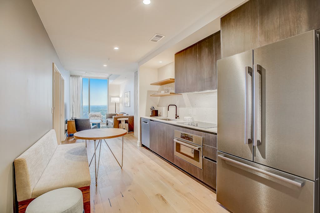 Sleek 15th-Floor Condo with Rooftop Pool, WiFi, Central AC, and Great Location