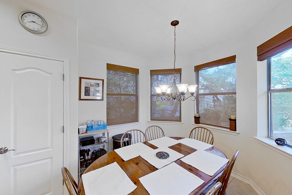 Scenic retreat with fenced yard, patio, central AC, & washer/dryer