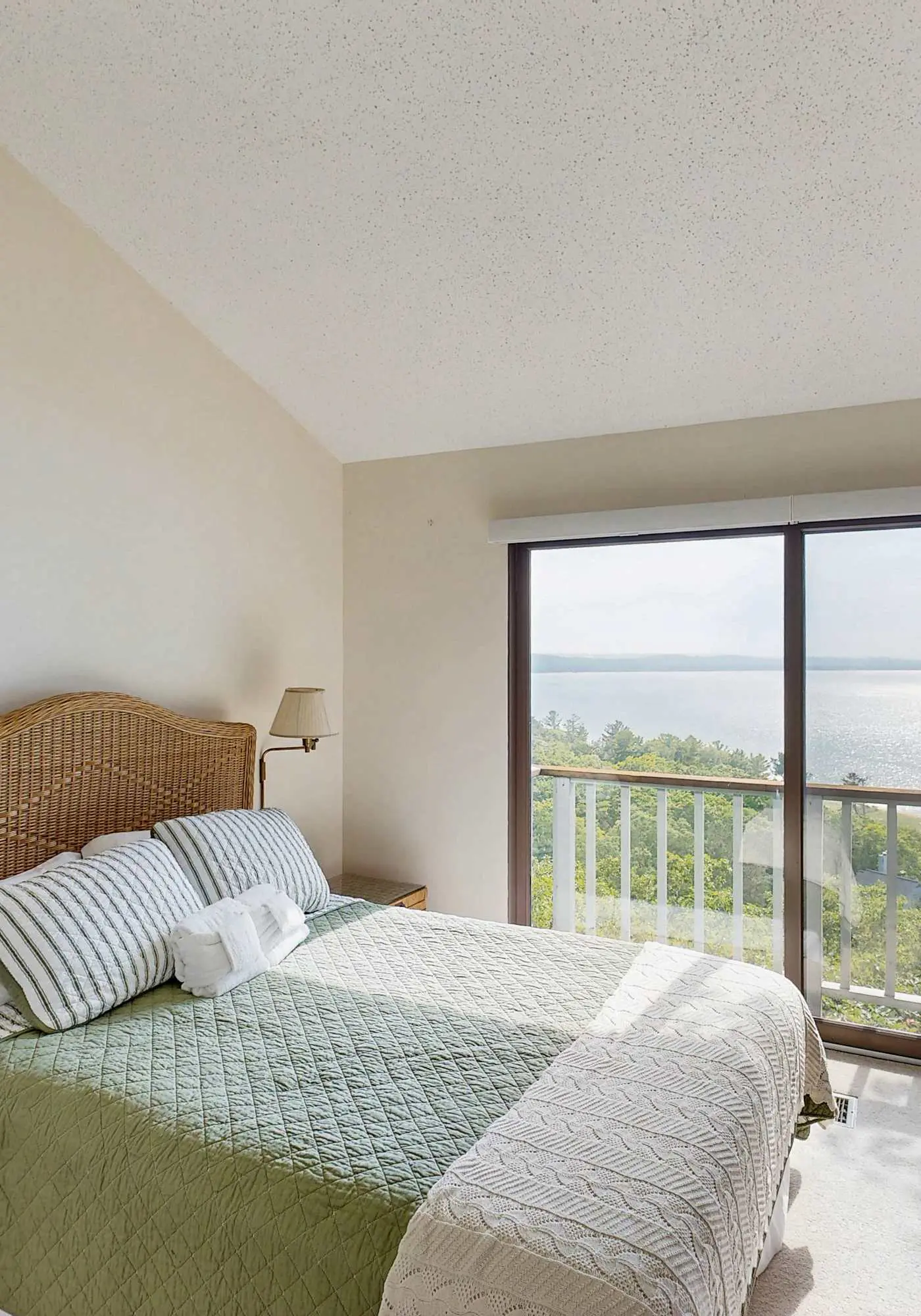 Condo in Glen Arbor with Lake Michigan sunset views, fireplace, deck, washer & dryer