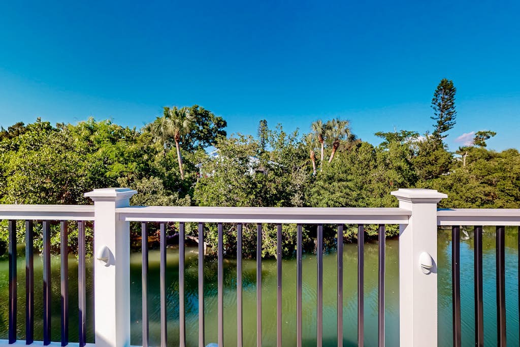 Canal-front home near Shell Beach with access to bay & deck