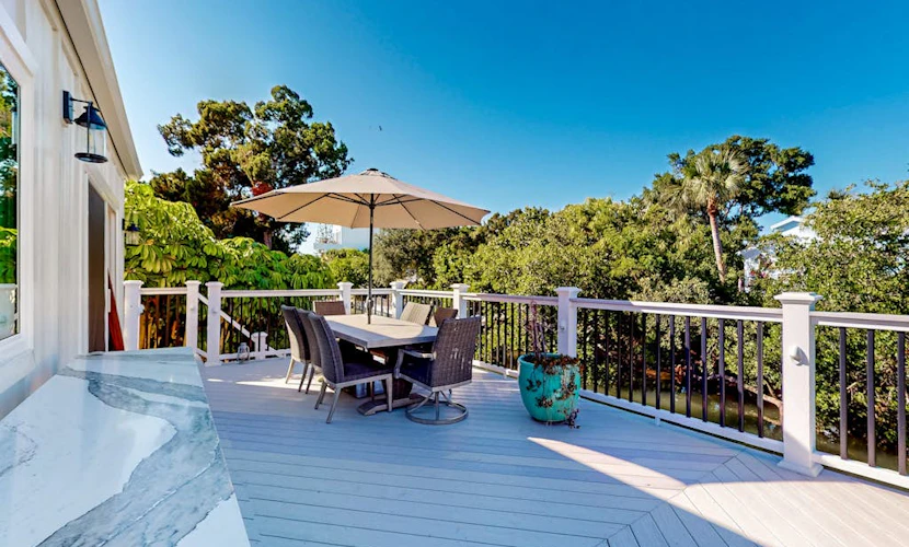 Canal-front home near Shell Beach with access to bay & deck