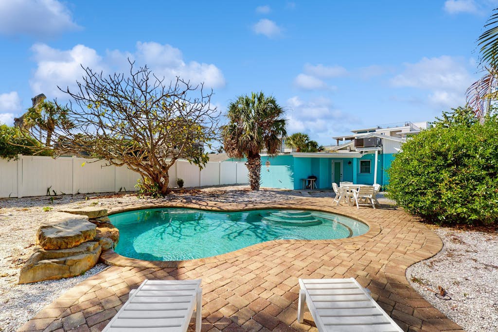 Colorful beach cottage w/ heated private pool & grill area - dog-friendly