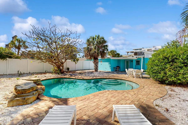 Colorful beach cottage w/ heated private pool & grill area - dog-friendly