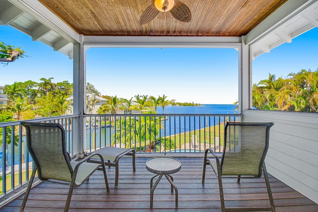 Waterfront home with heated pool + spa, patio, grill, & free WiFi - dog-friendly