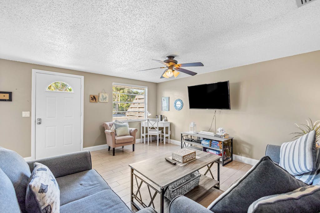 Updated duplex near beach with private yard, AC, & W/D