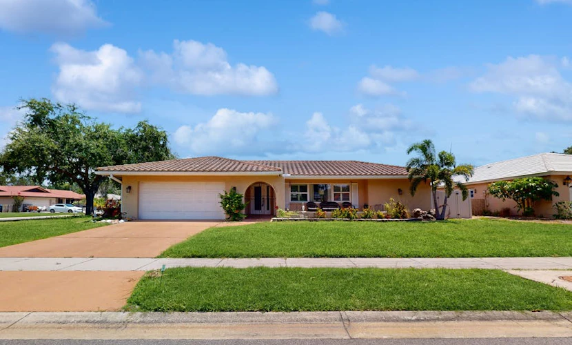 Dog-friendly house with pool, lanai, firepit, grill, patio, & enclosed backyard