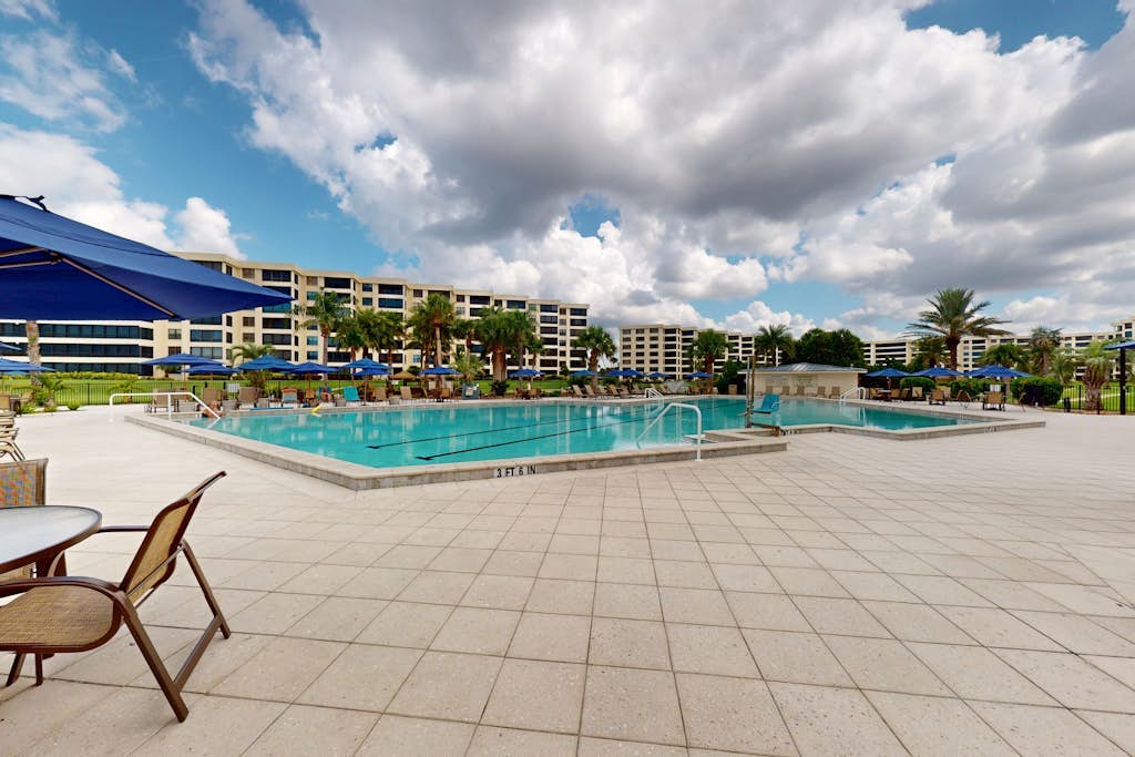 Stunning beachfront condo with panoramic views, pickelball, and dual masters