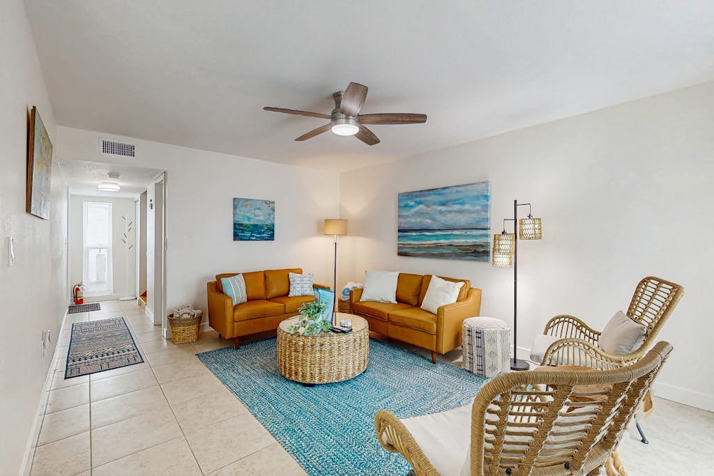 Snowbird-friendly townhome with shared pool, WiFi, & central AC - near the beach